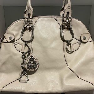 Juicy Couture bag.  Leather. Dust bad included.